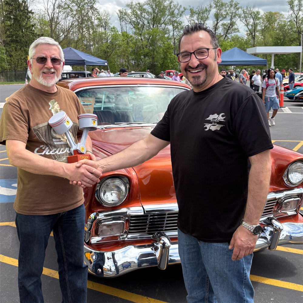  Picture of Mr. O shaking hands with the winner, Ray May.